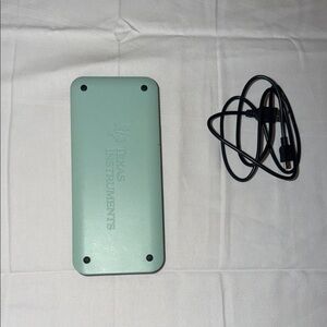 Texas Instruments Mint Green Device with Black Cable